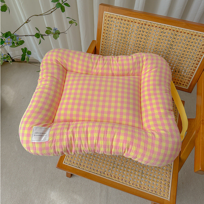 yellow and pink gingham cat bed