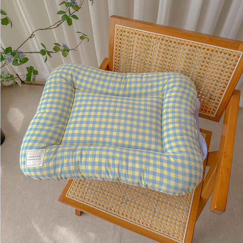 yellow and blue gingham cat bed